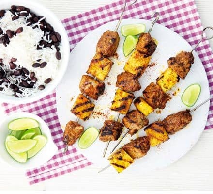 Jerk-seasoned pork & pineapple skewers with black beans & rice