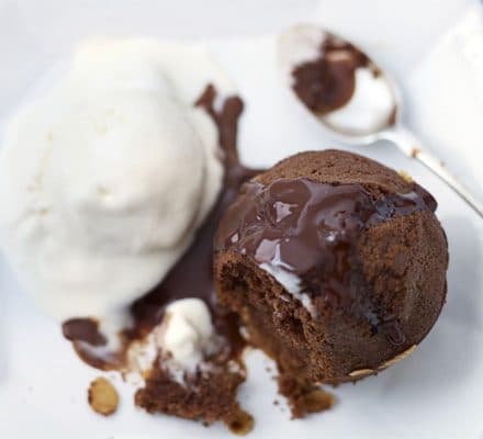 Chocolate & almond puds with boozy hot chocolate sauce