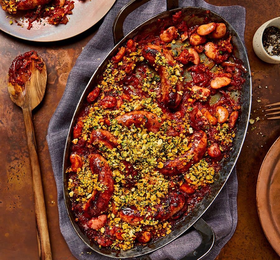 One-pot sausage casserole with garlic breadcrumbs