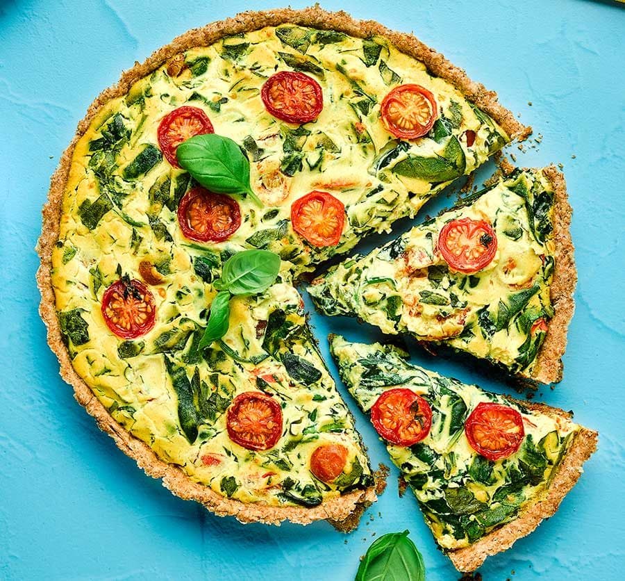 Vegan spinach & cherry tomato quiche