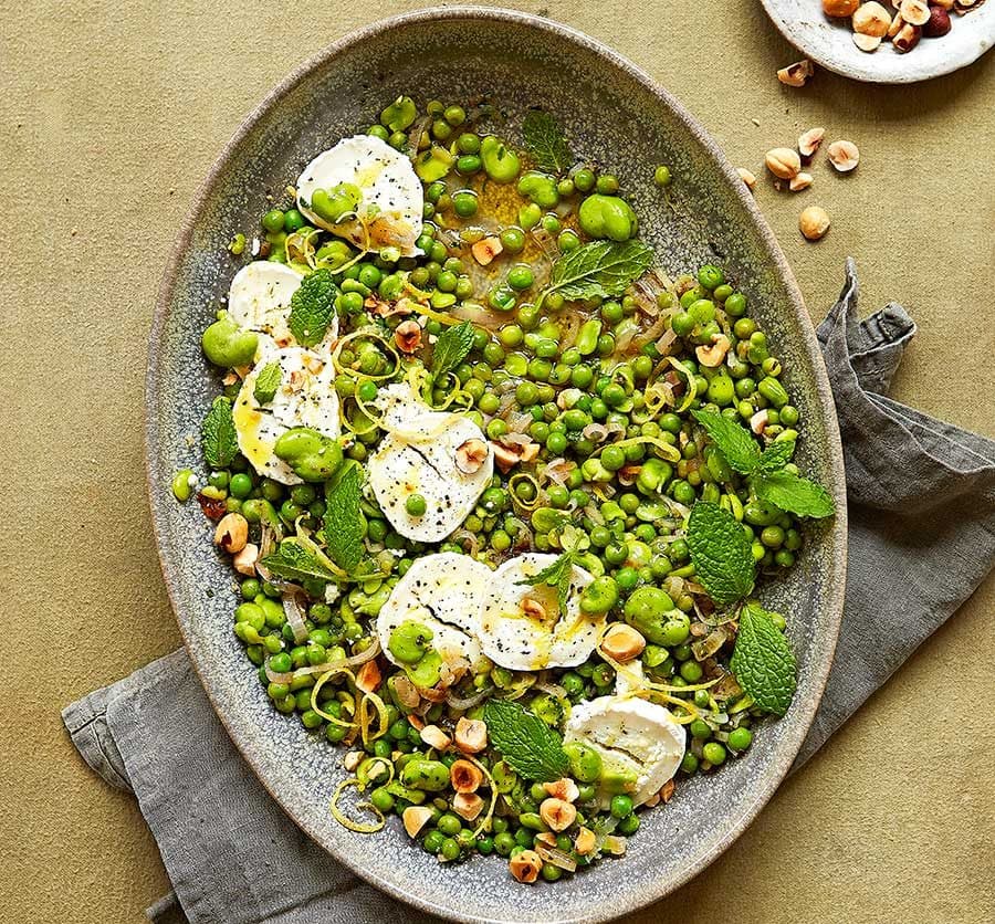 Lemony broad beans with goat's cheese, peas & mint