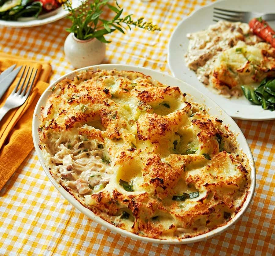 Poached chicken & pancetta pie with spring onion colcannon